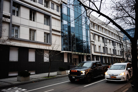 Chisinau, Moldova - November 22, 2025: City street view in Chisinau Moldova featuring a glass...