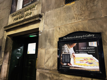 Manchester, UK - December 10, 2025: Historic Manchester building featuring a gallery sign and information board advertising free entry.のeditorial素材