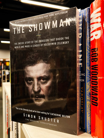 London, UK - December 12, 2025: A bold book cover, showcasing a serious Volodymyr Zelenskyy portrait on a political biography about leadership and history.のeditorial素材