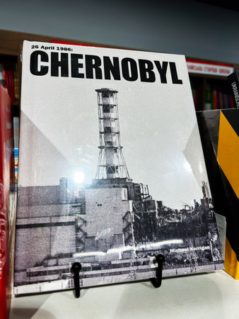 London, UK - December 12, 2025: Chernobyl book cover featuring a towering reactor structure with bold title and author name, black and white image. Michael Kerrigan, Chernobyl.のeditorial素材