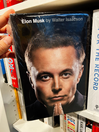 London, UK - December 12, 2025: Close-up of Elon Musk by Walter Isaacson cover displayed on a...