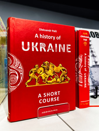 London, UK - December 12, 2025: Red hardcover book about Ukraine history with gold relief art, educational reference. Oleksandr Paliiのeditorial素材