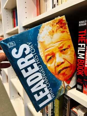 London, UK - December 12, 2025: Close view of a blue Leaders book cover on a library shelf, featuring the title Leaders and author Hong Chang.のeditorial素材