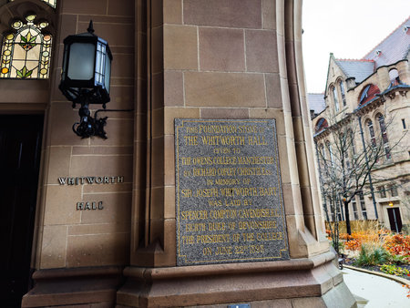 Manchester, UK - December 06, 2025: Historic Whitworth Hall features a foundation stone plaque and ornate architecture in Manchester, UK.のeditorial素材