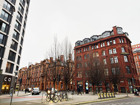 Manchester, UK - January 22, 2026: Urban scene in Manchester featuring red brick iQ Hollingworth...