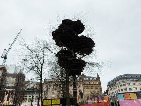 Manchester, UK - January 22, 2026: Striking urban topiary Piccadilly Gardens sculpture in Manchester center, blending nature with city life and modern architecture.のeditorial素材