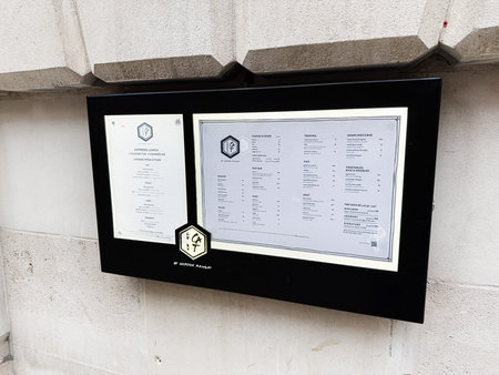Manchester, UK - January 29, 2026: Lucky Cat by Gordon Ramsay restaurant menu board on a wall in...