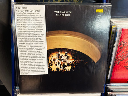 Manchester, UK - February 22, 2026: Shiny vinyl sleeve of Nils Frahm album Tripping With Nils Frahm showing live concert photo and record store display.のeditorial素材