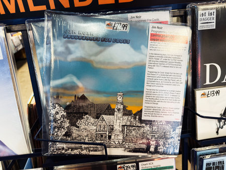 Manchester, UK - February 22, 2026: Retail display of Jim Noir Programmes for Cools 2023 indie vinyl showing illustrated town cover and price label.のeditorial素材
