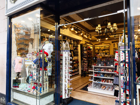 London, UK - February 01, 2026: Vibrant London storefront displaying souvenirs, clothing, and gift...