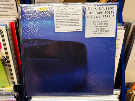 Blue-shaded Mark Crusane vinyl album The Tape Edits 2x12 part A in shrinkwrap on display among...