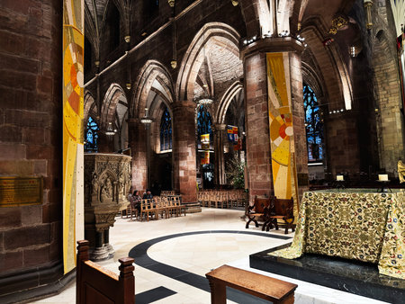 Edinburgh, Scotland, UK - February 15, 2026: Historic St Giles cathedral interior in Edinburgh with vaulted arches, stained glass, ornate altar and quiet seating for worship.のeditorial素材