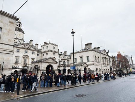 London, UK - February 02, 2026: Crowd of tourists and onlookers waiting outside Horse Guards to...