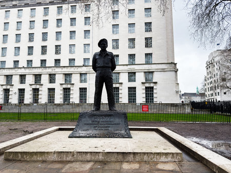 London, UK - February 02, 2026: Bronze Bernard Montgomery soldier statue stands on a stone pedestal in front of a large government building in London UK.のeditorial素材