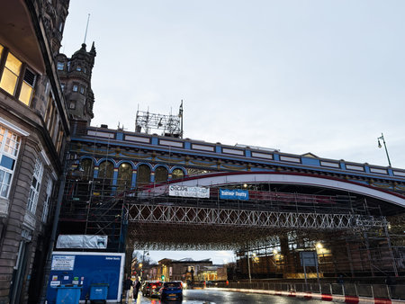 Edinburgh, Scotland, UK - February 15, 2026: Waverley Bridge covered in scaffolding for restoration,...