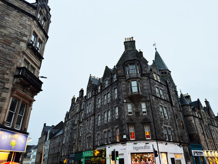 Edinburgh, Scotland, UK - February 15, 2026: Cloudy urban Canongate scene of historic stone...
