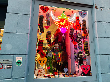 Edinburgh, Scotland, UK - February 15, 2026: Vibrant Socktopus sock shop window in Edinburgh with...