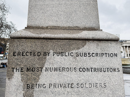 London, UK - February 02, 2026: Granite inscription on a monument base honoring private soldiers, located in Trafalgar Square, London UK.のeditorial素材
