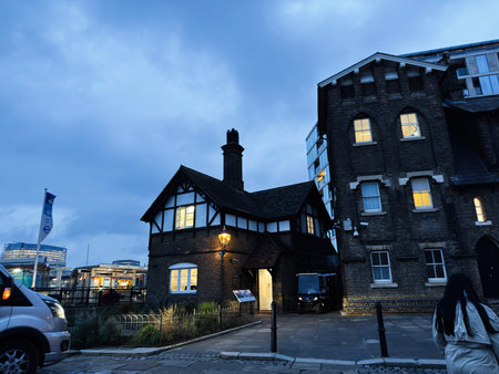 London, UK - February 02, 2026: Evening blue hour in London, UK showing a Tudor-style house and...