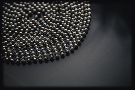 Silver Christmas tree chain decoration. Seasonal motive for cards and backgrounds.の写真素材