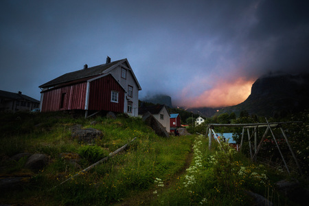 Summer evening in small fishong village Nusfjord in Lofoten Islands. Norwayの写真素材