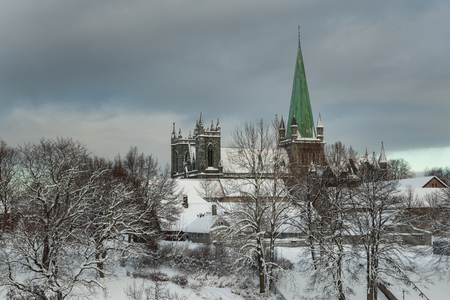 Nidarosdomen Cathedral by Nidelva river in Trondheim. Beautiful wintertime. Most famous gothic, norwegian church.の写真素材