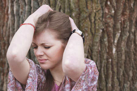 Young woman having a headache