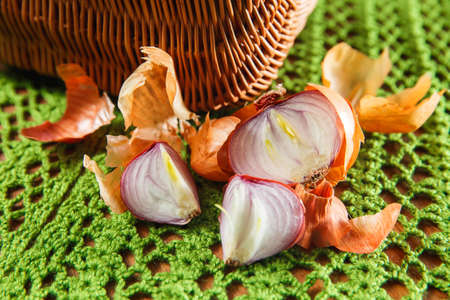 Fresh vegetables and herbs near basketの写真素材