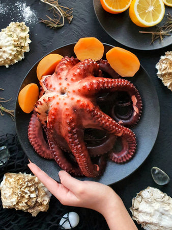 Freshly caught octopus is cooked for lunchの写真素材