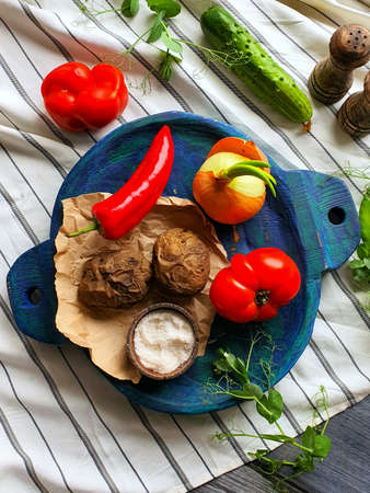Handmade wooden tableware. Beautiful serving of dishes. Folk cuisine. Russian traditions.の写真素材