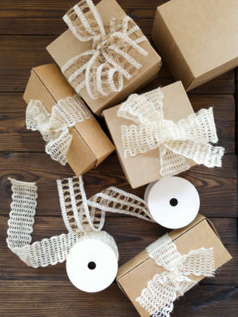 Preparation of christmas gifts. Gifts in craft paper.の写真素材