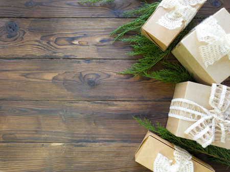Preparation of christmas gifts. Gifts in craft paper.の写真素材