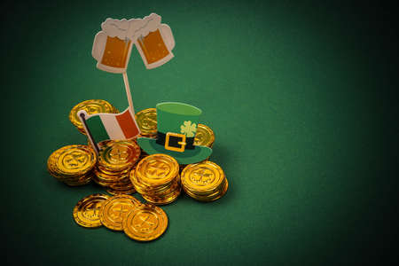 St. Patrick's Day concept with gold coins, Leprechaun hat and beer glassesの写真素材