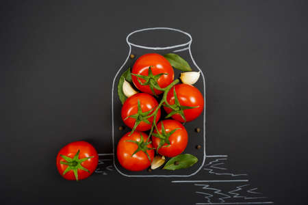 creative photo of canning ripe tomatoes for winterの写真素材