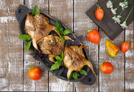 Freshly grilled quail. Fresh vegetables. Food photos.の写真素材