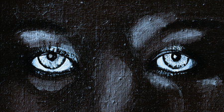 a painting in oil colors that only shows two eyesの写真素材