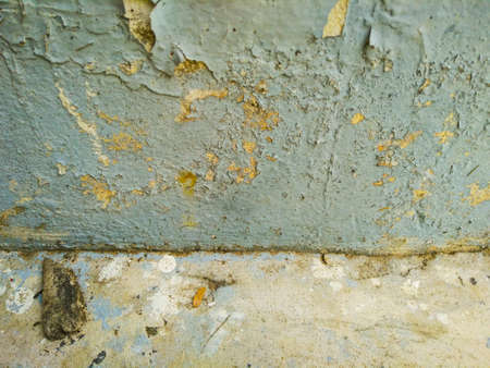 Peeling paint on the wall