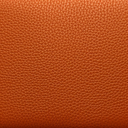 Orange leather texture closeup background. High resolution photo. Full depth of field.の素材