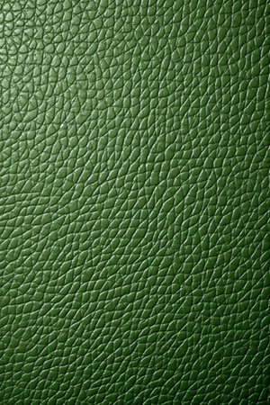 Green leather texture background for interior or exterior design with copy space for text or image.の素材