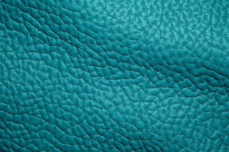 Turquoise leather texture close up. Background and texture for design.の素材