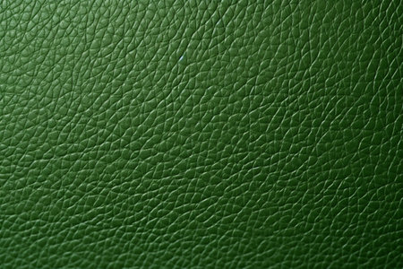 Green leather texture background. Close-up image of leather texture.の素材