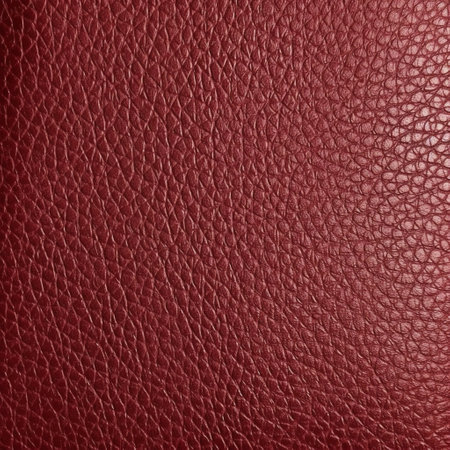 Red leather texture background. Close up of red leather texture background.の素材