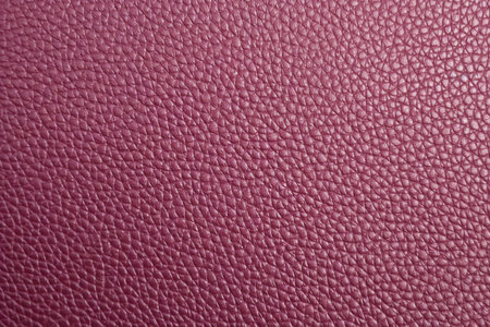 Pink leather texture background. Close up of pink leather texture background.の素材