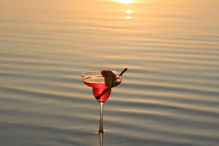 Sunset coctail in the seaの写真素材
