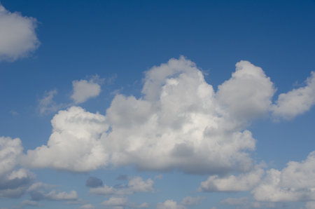 Blue sky with clouds over sea