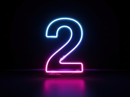 Illuminated neon number two on dark backgroundの素材