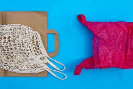 Natural reusable linen fabric and craft paper bags for shopping VS plastic bags. Eco friendly...