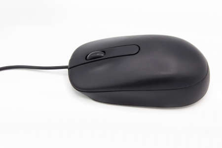 black computer mouse with wheel and cable on white background. side viewの写真素材