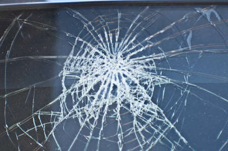 Front window the car crashed. Broken Glass. Automobile incident. Conceptual photo - danger