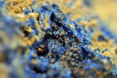Azurite is a soft, deep blue copper mineral produced by weathering of copper ore deposits with chemical composition Cu3(CO3)2(OH)2. Macro. Background for successful Your projectsの写真素材